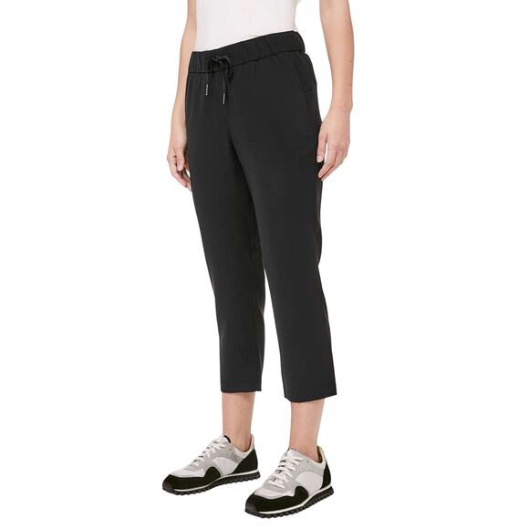 Lululemon On The Fly Crop Woven 23" Black Women's Size 4 Good Used Condition - Picture 1 of 9
